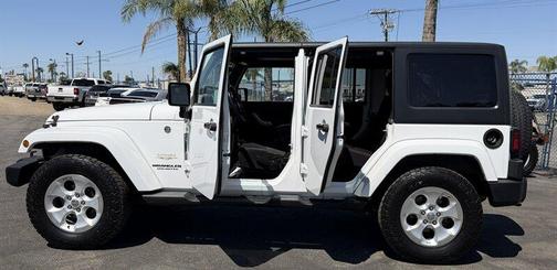 Bright White Clearcoat 2014 Jeep Wrangler Unlimited Sahara
