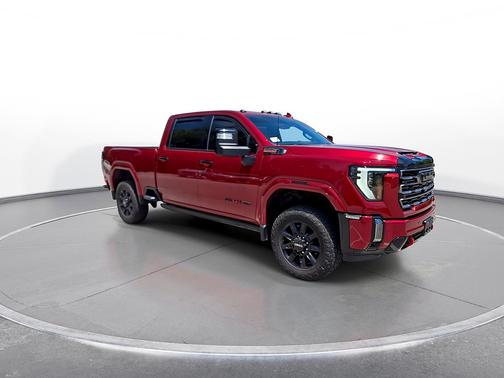Volcanic Red Tintcoat 2024 GMC Sierra 3500 4WD Crew Cab 159" AT4