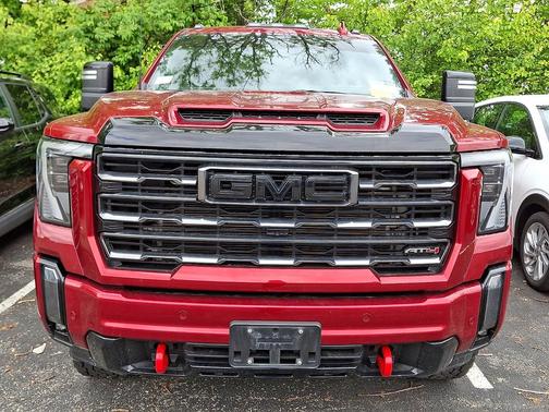 Volcanic Red Tintcoat 2024 GMC Sierra 3500 4WD Crew Cab 159" AT4