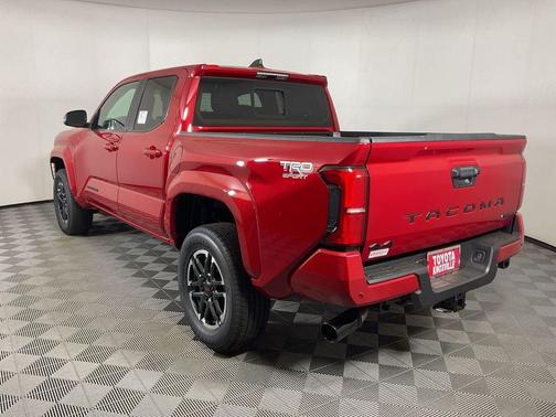 Red 2026 Toyota Tacoma Hybrid TRD Sport