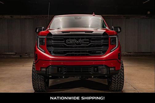Volcanic Red Tintcoat 2026 GMC Sierra 1500 AT4