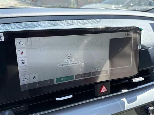 Ivory Silver 2026 Kia Carnival Hybrid SX