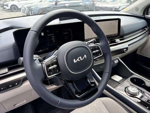 Ceramic Silver 2026 Kia Carnival Hybrid SX