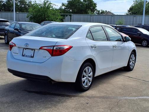 Super White 2016 Toyota Corolla LE