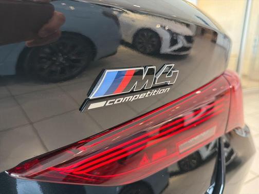 Black Sapphire Metallic 2025 BMW M4 Competition xDrive