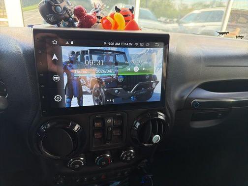 Black Clearcoat 2012 Jeep Wrangler Unlimited Sahara