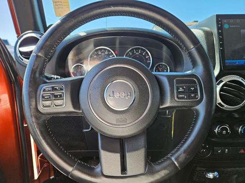 Copperhead Pearlcoat 2014 Jeep Wrangler Unlimited Sahara