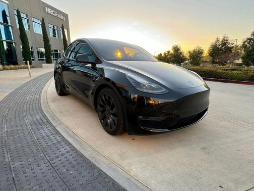 Solid Black 2023 Tesla Model Y Performance Dual Motor All-Wheel Drive