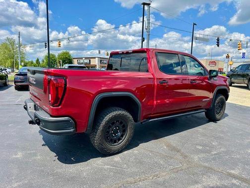 Volcanic Red Tintcoat 2023 GMC Sierra 1500 AT4X