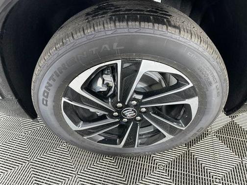 Stone Metallic 2026 Buick Enclave Sport Touring