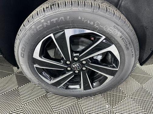 Stone Metallic 2026 Buick Enclave Sport Touring