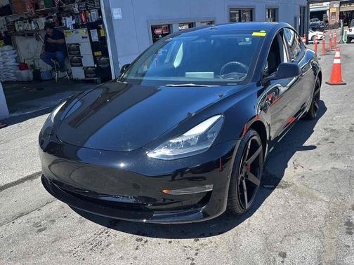 Solid Black 2022 Tesla Model 3 Performance AWD