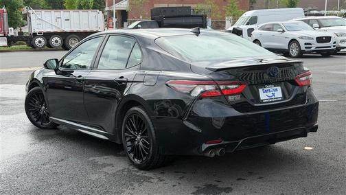Midnight Black Metallic 2022 Toyota Camry Nightshade Edition Hybrid