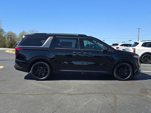 Aurora Black Pearl 2026 Kia Carnival Hybrid SX Prestige