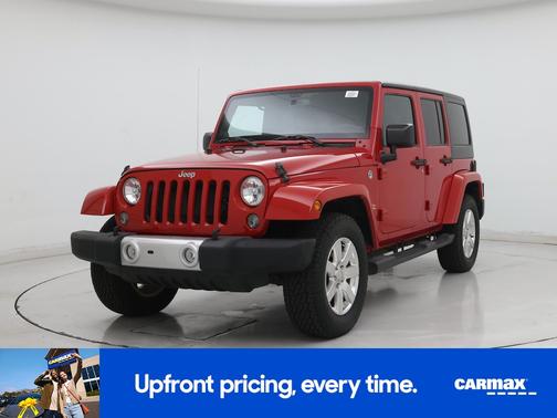 Red 2014 Jeep Wrangler Unlimited Sahara