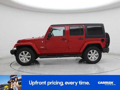 Red 2014 Jeep Wrangler Unlimited Sahara