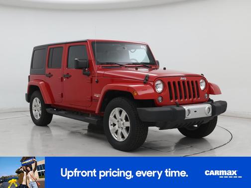 Red 2014 Jeep Wrangler Unlimited Sahara