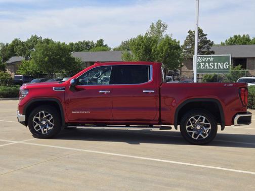 Volcanic Red Tintcoat 2026 GMC Sierra 1500 SLT