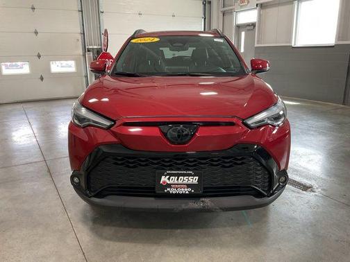 Barcelona Red Metallic 2024 Toyota Corolla Hybrid SE