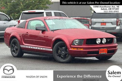 Red 2005 Ford Mustang Deluxe
