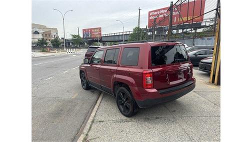 Red 2014 Jeep Patriot Sport