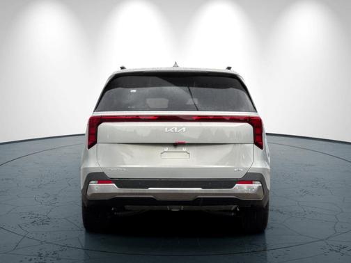 Ivory Silver 2026 Kia Carnival Hybrid SX