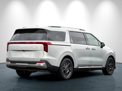 Ivory Silver 2026 Kia Carnival Hybrid SX