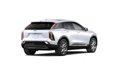 Vibrant White Tricoat 2026 Cadillac OPTIQ Luxury