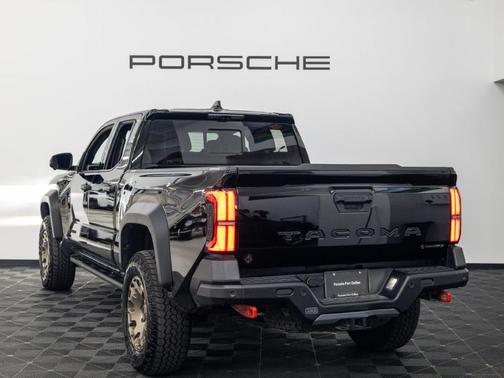 Black 2026 Toyota Tacoma Hybrid TRAILHUNTER