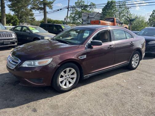 Burgundy 2010 Ford Taurus SE
