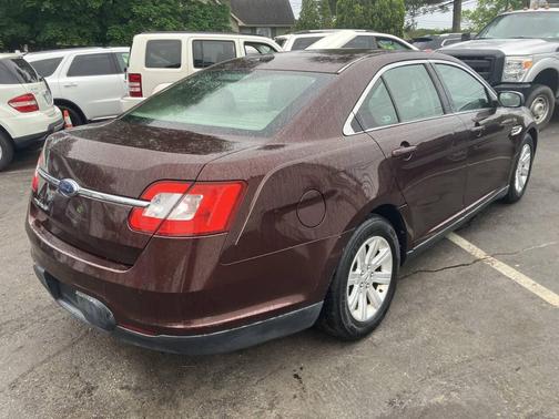 Burgundy 2010 Ford Taurus SE