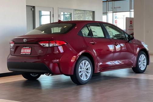 Ruby Flare Pearl 2026 Toyota Corolla Hybrid LE