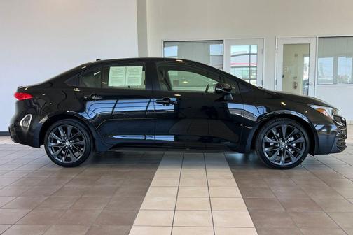 Midnight Black Metallic 2024 Toyota Corolla Hybrid SE