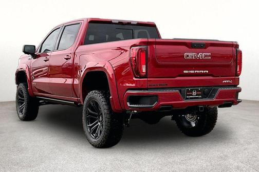 Volcanic Red Tintcoat 2026 GMC Sierra 1500 AT4