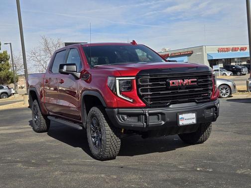 Volcanic Red 2026 GMC Sierra 1500 AT4X