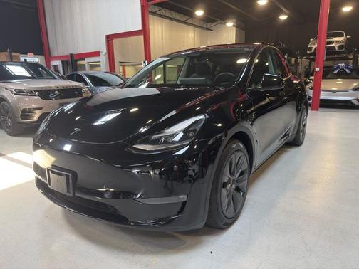Solid Black 2025 Tesla Model Y Long Range Dual Motor All-Wheel Drive