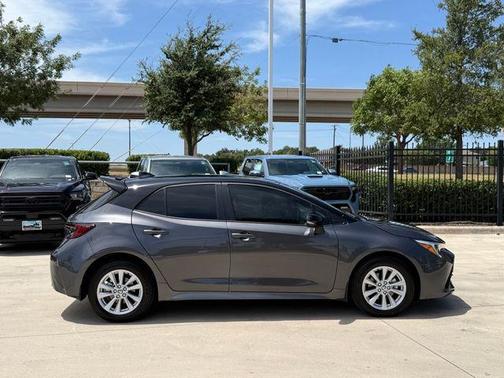 Midnight Black Metallic 2026 Toyota Corolla Hatchback SE