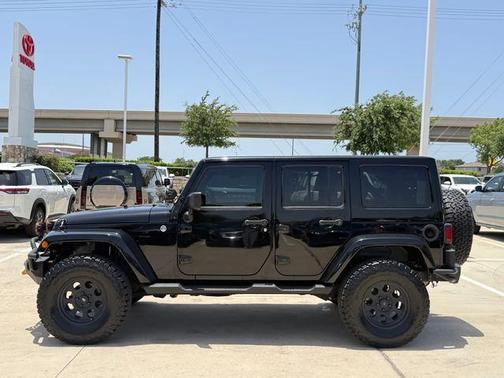 Black Clearcoat 2015 Jeep Wrangler Unlimited Sahara
