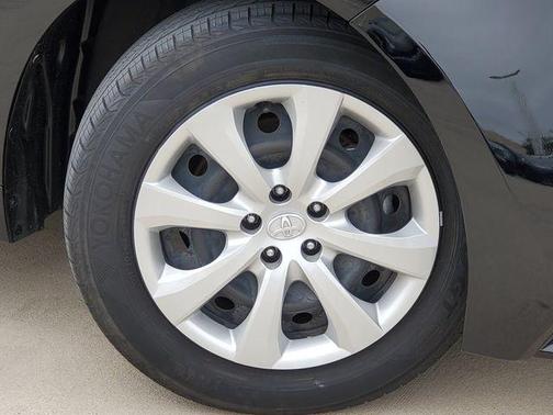 Midnight Black Metallic 2024 Toyota Corolla Hybrid LE
