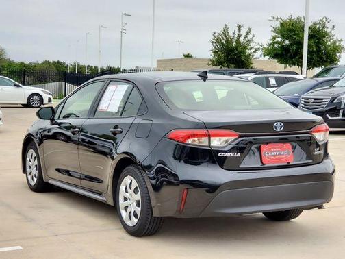 Midnight Black Metallic 2024 Toyota Corolla Hybrid LE