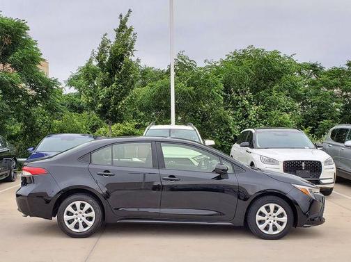 Midnight Black Metallic 2024 Toyota Corolla Hybrid LE