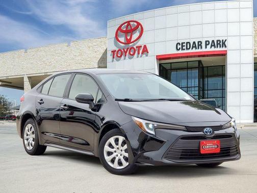 Midnight Black Metallic 2024 Toyota Corolla Hybrid LE