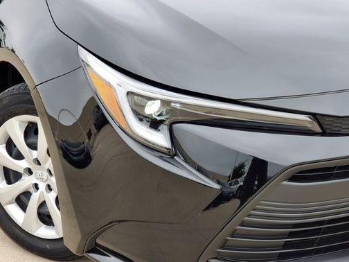 Midnight Black Metallic 2024 Toyota Corolla Hybrid LE