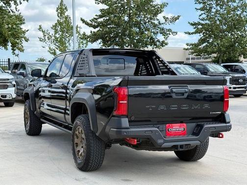 Black 2025 Toyota Tacoma Hybrid TRAILHUNTER