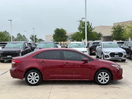 Pearl 2026 Toyota Corolla Hybrid LE