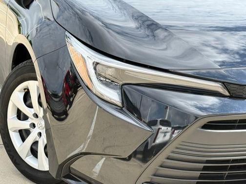 Midnight Black Metallic 2024 Toyota Corolla Hybrid LE