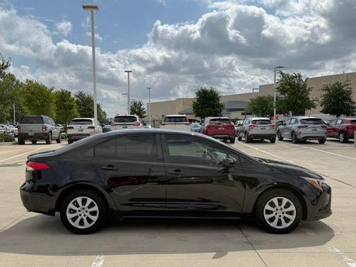 Midnight Black Metallic 2024 Toyota Corolla Hybrid LE