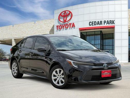 Midnight Black Metallic 2024 Toyota Corolla Hybrid LE