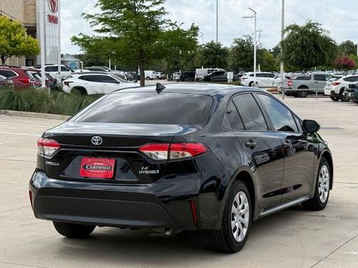 Midnight Black Metallic 2024 Toyota Corolla Hybrid LE