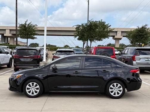Midnight Black Metallic 2024 Toyota Corolla Hybrid LE